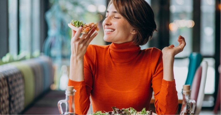 young-pretty-woman-eating-pizza-pizza-bar